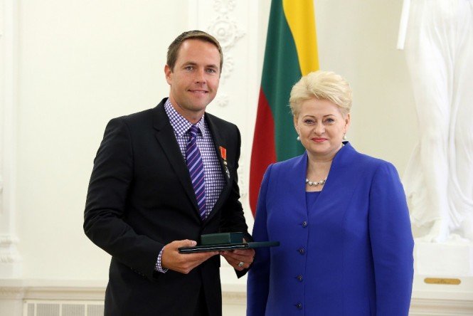 Marius Markevičius ir Prezidentė Dalia Grybauskaitė. Džojos Gundos Barysaitės nuotrauka